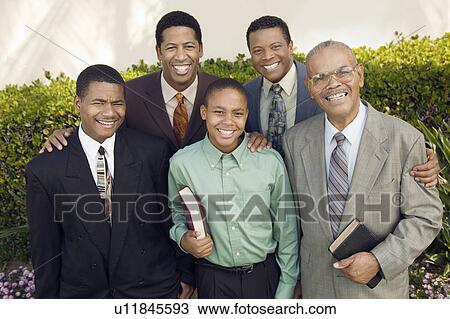 Stock Image - Group of male churchgoers, portrait. Fotosearch
