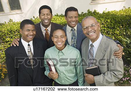 Stock Image - Group of male churchgoers, portrait. Fotosearch