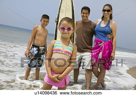 Little Girl with Her Family on Beach View Large Photo Image Stock Photograph - Little Girl with Her Family on Beach. Fotosearch