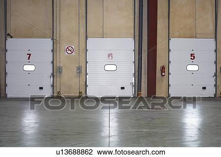 Loading Dock Doors in warehouse View Large Photo Image Stock Image - Loading Dock Doors in warehouse. Fotosearch