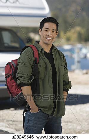 Man wearing backpack by RV View Large Photo Image Stock Photograph - Man wearing backpack by RV. Fotosearch