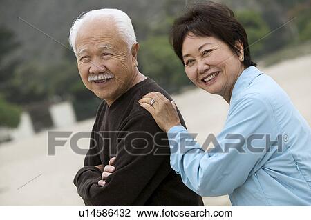 Mature couple, outdoors, (portrait) View Large Photo Image Stock Image - Mature couple, outdoors, (portrait). Fotosearch