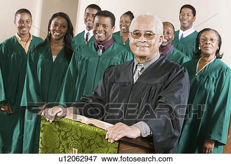 Minister at podium with Gospel Choir, portrait View Large Photo Image Stock Photo - Minister at podium with Gospel Choir, portrait. Fotosearch