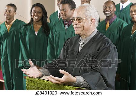 Minister Preaching in Front of Gospel Choir View Large Photo Image Stock Image - Minister Preaching in Front of Gospel Choir. Fotosearch