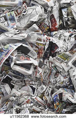 Stock Photo - Pile of scrunched up newspapers, full frame. Fotosearch