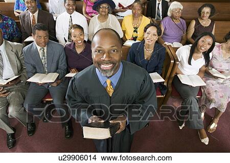 Picture - Preacher and Congregation, portrait, high angle view. Fotosearch
