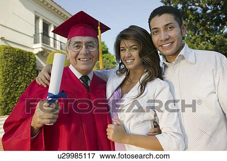Senior Graduate with son and daughter outside, portrait View Large Photo Image Stock Photo - Senior Graduate with son and daughter outside, portrait. Fotosearch
