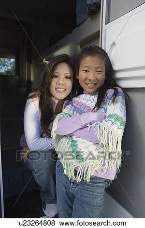 Sisters standing inside RV View Large Photo Image Stock Photo - Sisters standing inside RV. Fotosearch