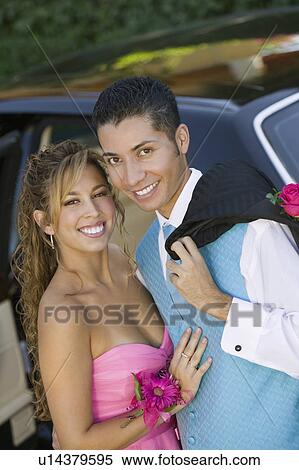 Well dressed teenage couple outside limo, portrait View Large Photo Image Stock Photography - Well dressed teenage couple outside limo, portrait. Fotosearch