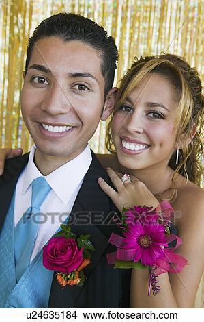 Picture - Well-dressed teenagers at school dance, portrait. Fotosearch