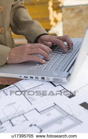 Architect using laptop View Large Photo Image Stock Photography - Architect using laptop. Fotosearch
