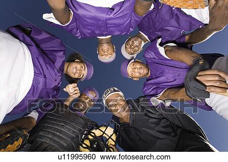 Baseball team in huddle, (portrait), (view from below) View Large Photo Image Stock Image - Baseball team in huddle, (portrait), (view from below). Fotosearch