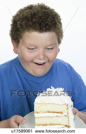 Boy Holding Cake View Large Photo Image Stock Image - Boy Holding Cake. Fotosearch