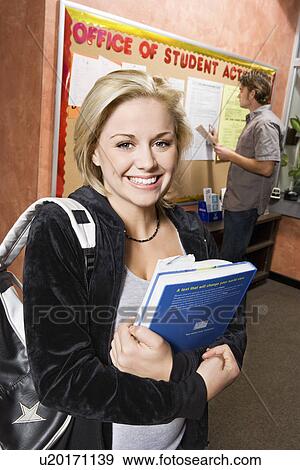 Stock Photo - College students at action centre office. Fotosearch
