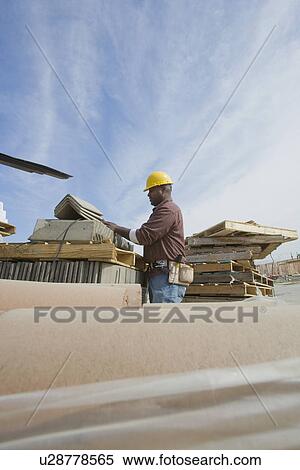 Construction worker on site View Large Photo Image Stock Photography - Construction worker on site. Fotosearch