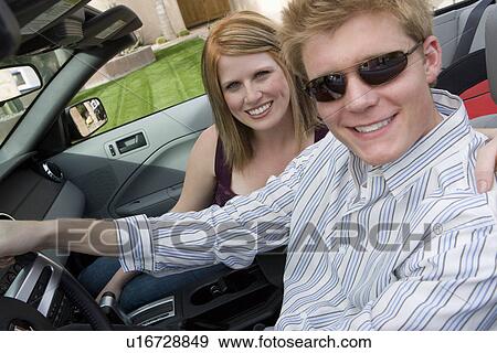 Stock Photo - Couple Driving Car. Fotosearch