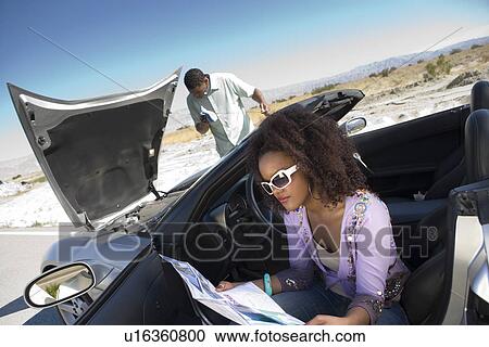 Couple Having Car Trouble View Large Photo Image Stock Image - Couple Having Car Trouble. Fotosearch