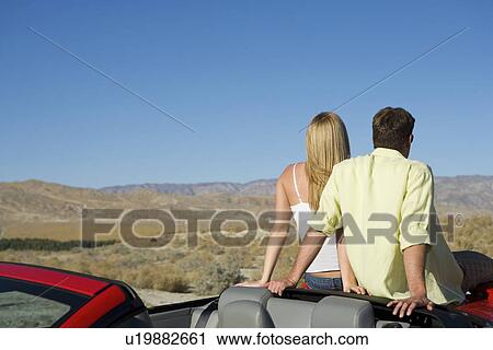Couple Taking a Break from Driving View Large Photo Image Stock Image - Couple Taking a Break from Driving. Fotosearch