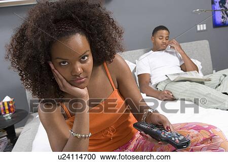 Stock Image - Couple Together in Bed. Fotosearch