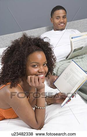 Stock Photo - Couple Together in Bed. Fotosearch
