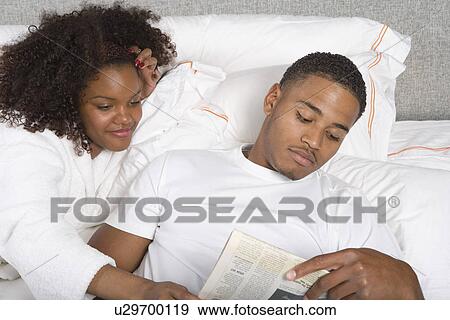 Stock Photo - Couple Together in Bed. Fotosearch