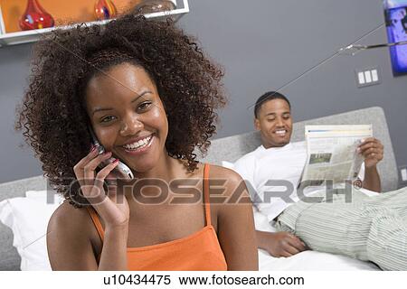 Stock Photography - Couple Together in Bed. Fotosearch