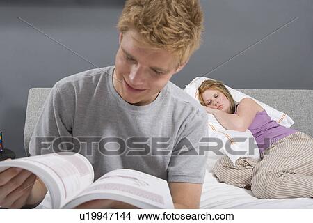 Picture - Couple Together in Bedroom. Fotosearch