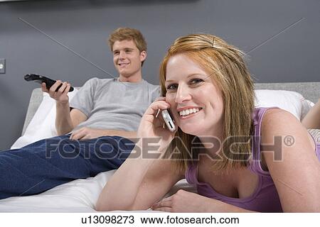 Stock Image - Couple Together in Bedroom. Fotosearch