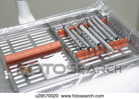 Dental tools in tray, (close-up) View Large Photo Image Stock Image - Dental tools in tray, (close-up). Fotosearch