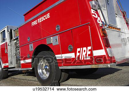 Fire rescue truck parked on roadside View Large Photo Image Picture - Fire rescue truck parked on roadside. Fotosearch