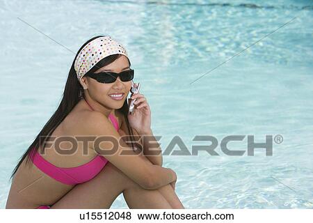 Girl Sitting by Swimming Pool View Large Photo Image Stock Photo - Girl Sitting by Swimming Pool. Fotosearch