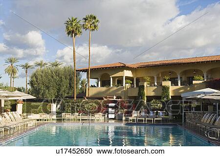 Stock Image - Hotel swimming pool. Fotosearch
