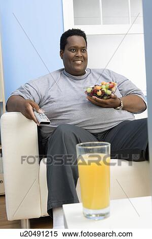 Man Eating Bowl of Fruit View Large Photo Image Stock Photography - Man Eating Bowl of Fruit. Fotosearch