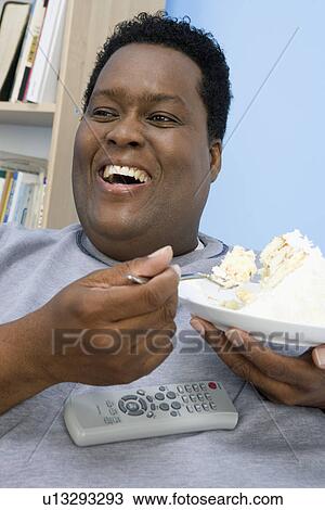 Man Eating Cake View Large Photo Image Stock Image - Man Eating Cake. Fotosearch
