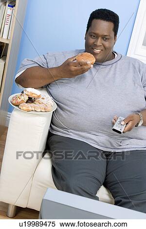 Man Eating Donut View Large Photo Image Stock Photography - Man Eating Donut. Fotosearch