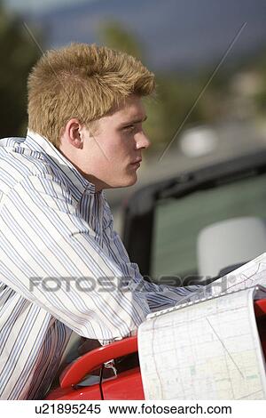 Man Looking at Road Map View Large Photo Image Stock Photography - Man Looking at Road Map. Fotosearch