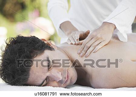 Man Receiving a Massage, head and shoulders View Large Photo Image Stock Image - Man Receiving a Massage, head and shoulders. Fotosearch