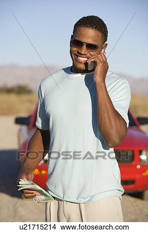 Picture - Man Using Cell Phone. Fotosearch