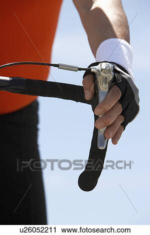 Man with hand on bicycle brake, close-up on hand View Large Photo Image Stock Image - Man with hand on bicycle brake, close-up on hand. Fotosearch