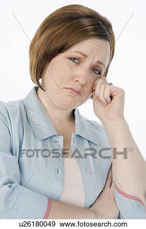 Stock Photo - Mature woman crying, portrait. Fotosearch