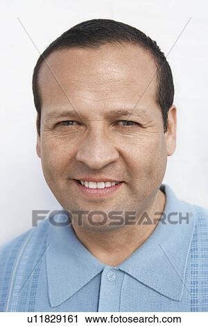 Stock Image - Mid-adult man, portrait. Fotosearch