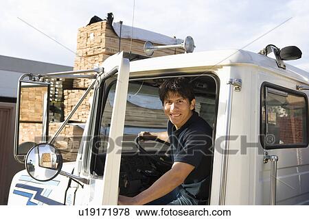 Mid-adult truck driver View Large Photo Image Stock Photo - Mid-adult truck driver. Fotosearch