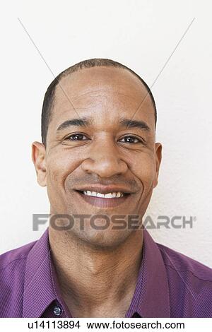 Picture - Middle aged man smiling, portrait. Fotosearch