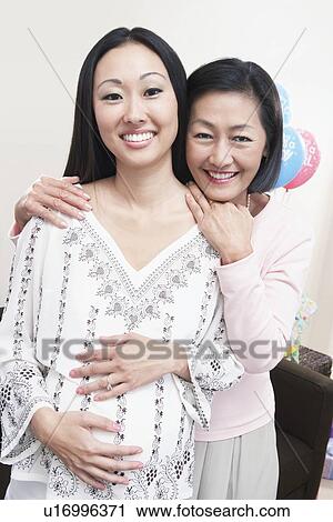 Mother and Daughter Enjoying a Baby Shower View Large Photo Image Stock Image - Mother and Daughter Enjoying a Baby Shower. Fotosearch