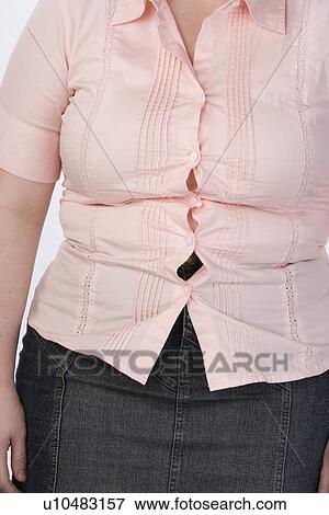 Overweight woman, mid-section View Large Photo Image Stock Photo - Overweight woman, mid-section. Fotosearch