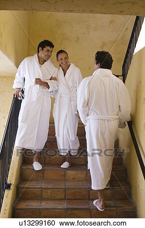 People in bathrobes, talking on stairs View Large Photo Image Stock Image - People in bathrobes, talking on stairs. Fotosearch