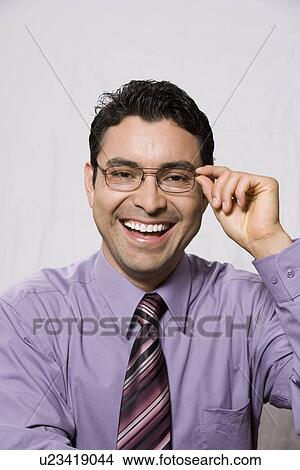Picture - Portrait of man wearing eyeglasses. Fotosearch