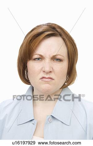 Portrait of mature woman, grimacing View Large Photo Image Stock Photo - Portrait of mature woman, grimacing. Fotosearch