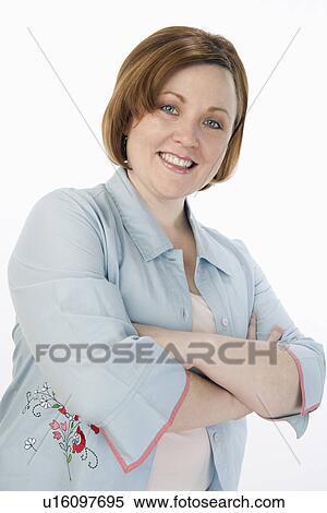 Stock Photography - Portrait of mature woman smiling. Fotosearch