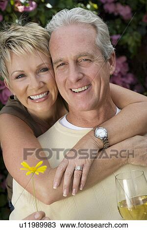 Stock Image - Portrait of middle-aged couple. Fotosearch
